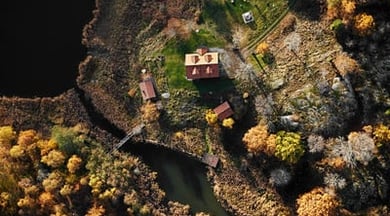 An aerial view of a house in the country side