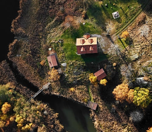 An aerial view of a house in the country side