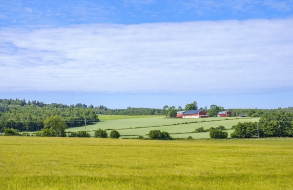 Landskap med bondgård i fonten